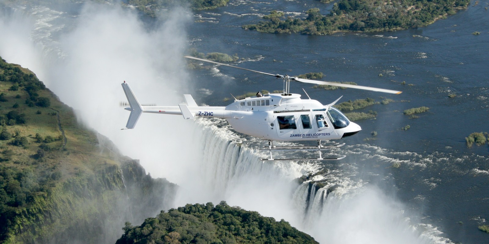Helicopter top of the water fall